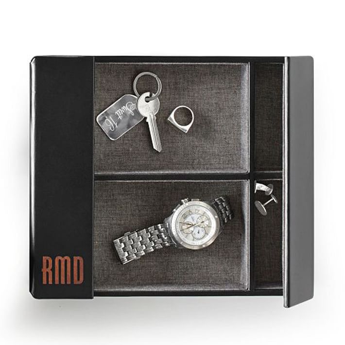 rustic-leather-valet This Rustic Leather Valet catchall for the bedroom or hall is made from wrapped saddle leather and lined in cotton chambray. It offers both exposed and concealed storage for watches and jewelry or keys and change — more gifts for him on @SavvyHome